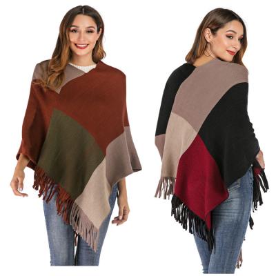 China Bat Wing Anti-Shrink Sleeve Crewneck Stripes Tassel Acrylic Sweater Poncho For Woman for sale