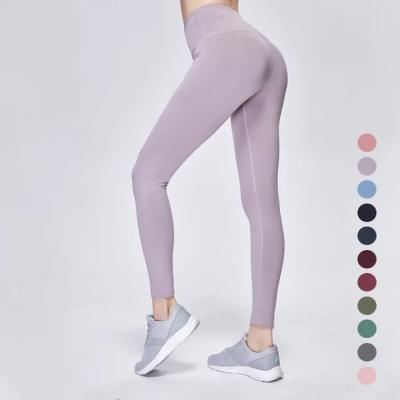 China 2021 Plus Size Women Anti-Static High Waist Yoga Pants Workout Leggings Quick-drying Solid Color Solid Color Tight Pants for sale