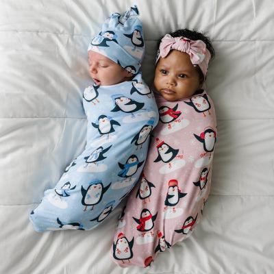 China 2022 anti-static wholesale newborn cartoon swaddle blanket and bow knot hat baby soft swaddle wrap set for baby for sale