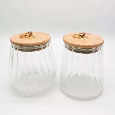 China Sustainable New Design Fashionable Multishaped Glassware Food Storage Canisters Spice Storage Jars Canister With Wooden Lid for sale