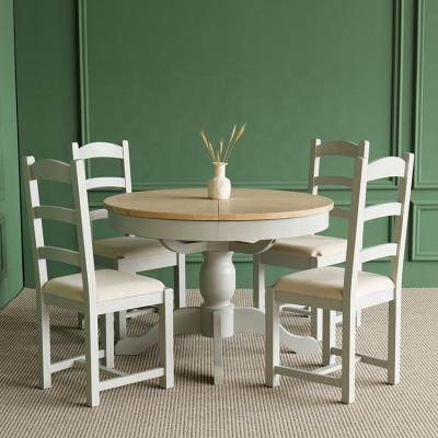 China Extendable British Oak Style Solid Wood Round Dining Tables and 6 Chair Sets for sale