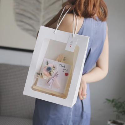 China Flower Wrapping Transparent Gift Box Rose Bouquet Packaging Bag Tote Bag Ins Window Flower 2021 Net Red Gift Bag for sale