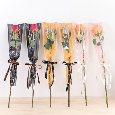 China Rose Moisture-proof Single Flower Bouquet Bag Transparent Festival Gift Bag for sale