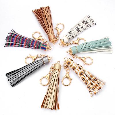 China High Quality Leather Alloy Key Chain Long Tassel Leopard Print Tassel Key Chain Car Bag Leather Pendant for sale