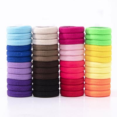 China New Children's 50Pcs/bag High Quality Color 3CM Mini Hair Ring Girls Simple Candy Color Elastic Hair Bands Kids Nylon Hair Ring for sale