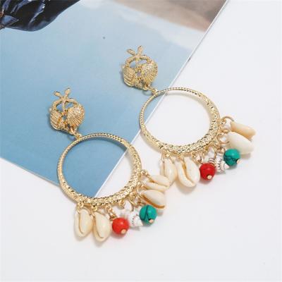 China FASHIONABLE Gold Shell Earrings Custom Made Alloy Shell Hoop Earrings For Women natural exaggerated simple fashion for sale