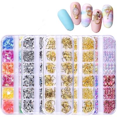 China Nail Art Decoration Metal Rivets 12grid/box Flat Bottom Diamond Shell Pearl Glitter Nail Art Japanese Rhinestone for sale