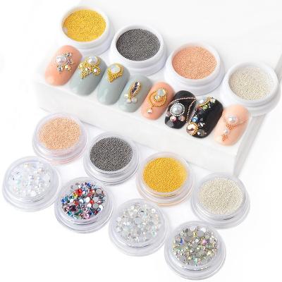 China 14 designs Eco-friendly Crystal Rhinestones Charm Nail Beads Mixed Caviar 3d DIY Nail Designs Mini Stainless Steel Ball Beads for sale