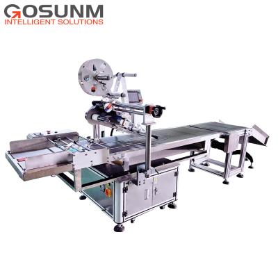 China Automatic CLOTHING Plastic Bag Top Surface Labeling Machine With Paging for sale