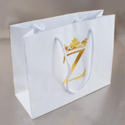 China China Recyclable High Quality 250gsm Ivory Board Shopping Paper Bag For Wedding Gift Favor for sale