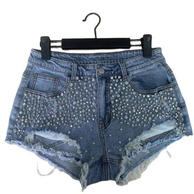 China QUICK DRY women's jeans ripped jeans shorts stitched with diamonds for sale