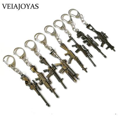 China FASHIONABLE Game Playerunknown's Battlegrounds Cosplay Weapons Keychains 6.5cm PUBG AK47 M16 Alloy Car Key Holder Souvenir For Men for sale