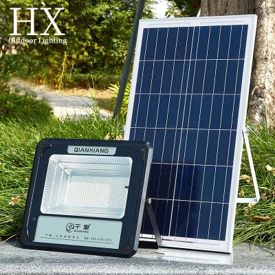 China Residential High Lumen Ip65 Reflector Outdoor Waterproof Solar Garden Lights Industrial Led Solar Flood Light for sale