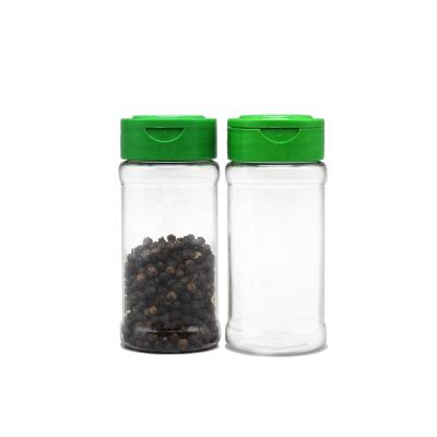 China Cooking Clear Volume 135ml Full Round PET Spice Water Spice Packaging Bottle Plastic Green Flip Top Cap For Packing Black Pepper Powder for sale