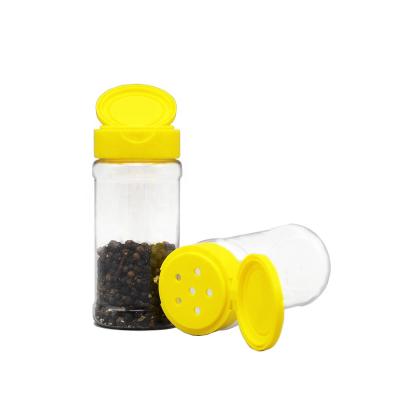 China Cooking 100ml Plastic Spice Cylinder Spice Packing Container And Clear Round PET Plastic Pepper Seasoning Jar With Yellow Flip Top Cap for sale