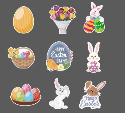 China Festival decoration Easter logo decoration, pattern raincoat decoration with wooden stakes, party supplies, raincoats for sale