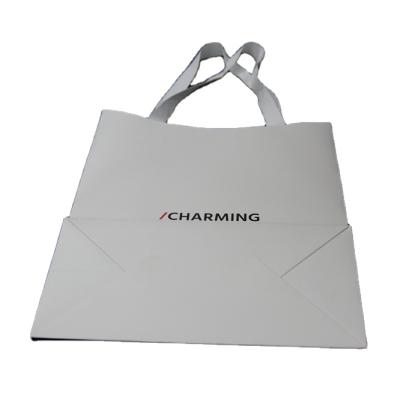 China Materials Factory Good Quality Recycled Custom Wholesale White Color Paper Gift Bag for sale