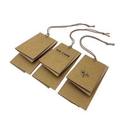 China New Brown Recyled Fold Design Kraft Paper Hang Tag For Garment With String Craft Paper Hanging Hang Tag for sale