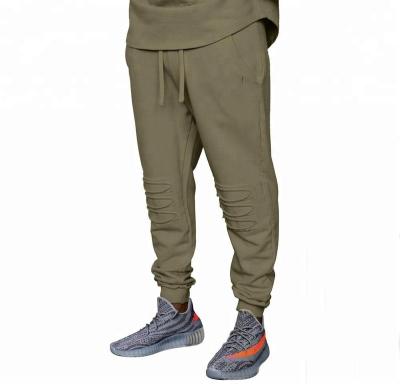 China Anti-static elastic waist men trackpants with knee patch cotton hip hop ankle banded track pants for man designs streetwear twill trackers for sale