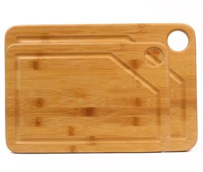 China Sustainable Kitchen High Quality Natural Solid Bamboo Cutting Board Choppers for sale