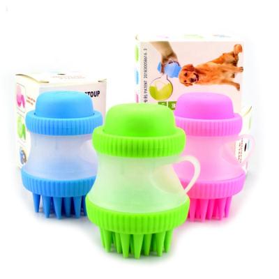 China Viable Effective Dog Grooming Comb Silicone Pet Massager Bath Cleaning Brush With Bath Foam Storage for sale