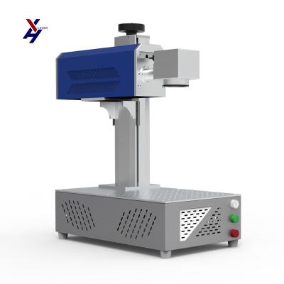 China Raycus Max Ipg Mopa Metal Optical Fiber Laser Marking Machine with 110mm*110mm Marking Area for sale