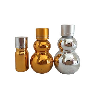 China Small Double Gourd Bottle Different Sizes Empty Gourd Glass Essential Oil Bottle Herbal Customizable Plated Essential Oil Spray Portable Sample for sale