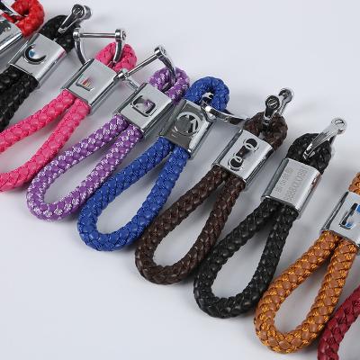 China Car Customized Horseshoe Buckle Rope Braided Leather Personality Creative Key Chain For Advertising Vehicles for sale