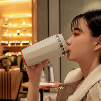 China New Viable Portable Suction Magic Water Bottle Not Pouring Mug Splash Proof Sports Office Non-Slip Anti-Scalding Coffee Mug for sale