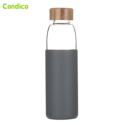 China Sustainable Wholesale Eco Reusable Silicone Cups Borosilicate Glass Fruit Water Bottle 500ml Infusion Glass Water Bottles With Bamboo Lids for sale