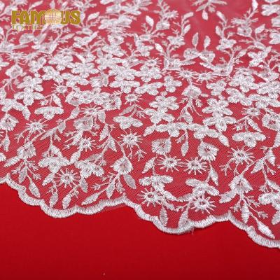 China Viable high quality white simple design embroidery lace fabric with sequins for dress dress for sale