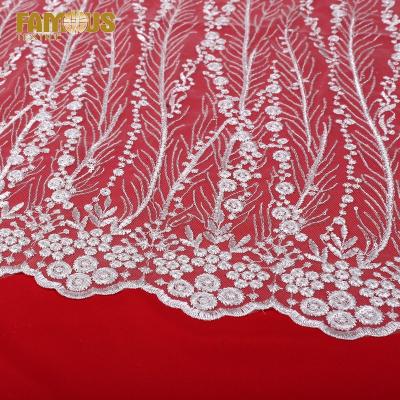 China New Design Viable Fashion White Bridal Lace Fabric Embroidery With Clear Sequins For Women Dress for sale