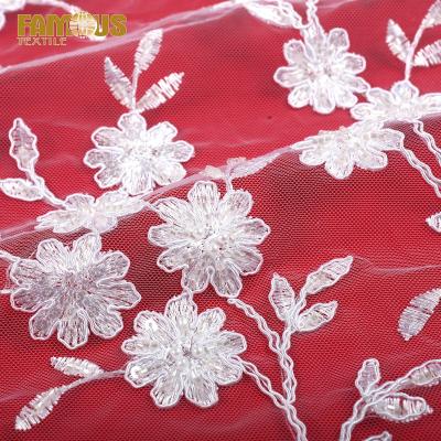 China Other high quality design wequins white bridal beaded rope embroidery lace materials shiny fabric for wedding for sale