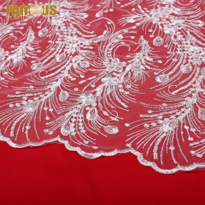 China Factory price viable design bridal lace fabric embroidery with clear sequins for wedding dress for sale