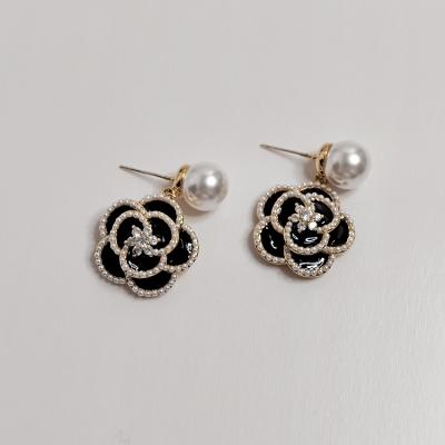 China Hyacinth French Style Light Luxury CLASSIQUE Inlaid Black Zircon 925 Silver Needle Camellia Pearl Earrings for sale