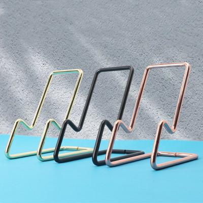 China YS1211 Waterproof Unique Metal Wire Recliner Form Room Decorations Photo Frame Folding 2022 Tablet Kindle Holder Mobile Cell Phone Holders for sale