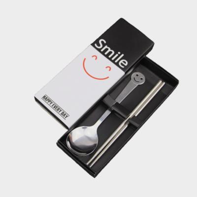 China Sustainable 2020 Stainless Steel Chopsticks And Smiling Face Spoon Kids Cutlery Set for sale