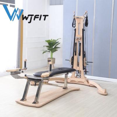 China Fitness Center Multi Functional Commercial Gym Pilates Equipment Wooden Gyro Tower and Bench for sale