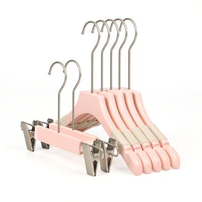 China CLASSIC wholesale non-customized slip and traceless pants rack pink wooden kids baby clothes coats hangers for clothing store for sale