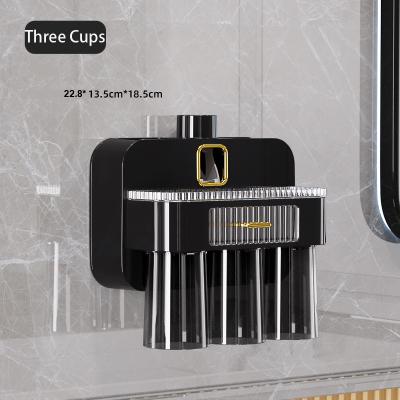 China 2022 New Viable Toothbrushes and Three Cups Accessories Automatic Organizer Bathroom Dispenser Toothpaste Holder for sale