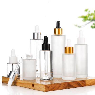 China Cosmetic wholesale price frosted 30ml 50ml 100ml clear amber arabic perfume bottle essential oil bottles with dropper and packaging box for sale