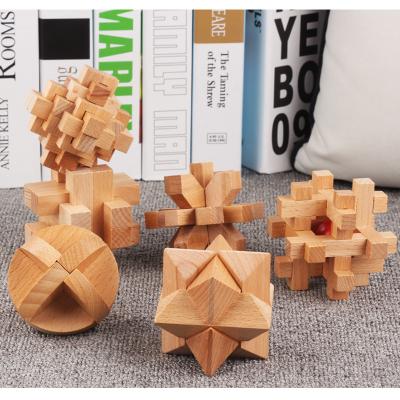 China Mini children's and adults' metal and wooden puzzles deal with intelligence and logic and hand open 3D games wire chain case Amazon hot for sale