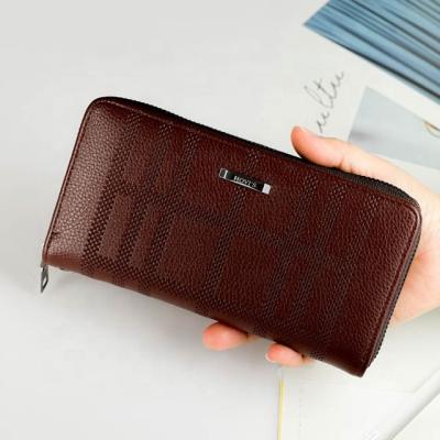 China Minimalist 2022 Summer New Arrival Money Zipper Purse Long Fashionable Clip Wallet With Wrist Strap PU Leather Phone Wallet Immediately Available for sale