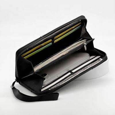 China Japan style 2022 summer newest Japan style zipper wallet along with wrist band money clip wallet PU leather phone wallet for sale