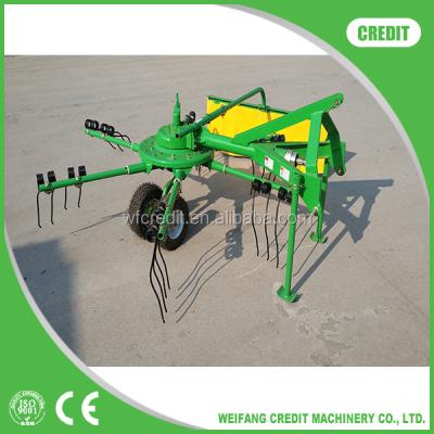 China NEW KIND TOP QUALITY Cleaning TRACTOR MOUNTED FOLDING ROTARY WHEEL RAKE for sale