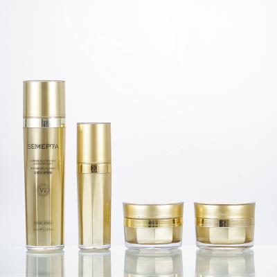 Cina 15g 30g 80ml 100ml Imballaggio cosmetico di lusso Barattolo crema oro acrilico e bottiglia per lozione in vendita