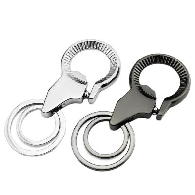 China Viable Creative Multifunctional Car Waist Opener Bottle Handcuffs Buckle Key Chain for sale