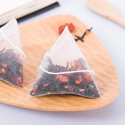 China Boiled Reliable Slightly Sweet Water And Black Material Red Color Flavored Strawberry Black Tea for sale