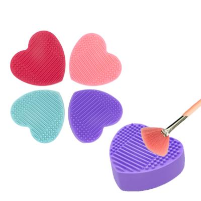 China Daily Cleaning Fashion Mini Soft Easy To Clean Cute Heart Shape Cosmetic Silicone Makeup Brush Cleaning Mat for sale