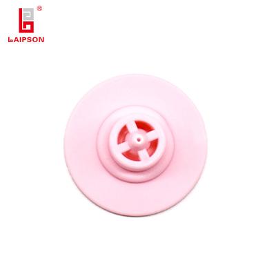 Chine Nouvelle étiquette en TPU OEM personnalisée 28 mm ronde pour porc avec tête fermée pour étiquette d'oreille de vache pour porc à vendre